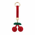 Schlüsselanhänger & Taschenaccessoire mit Kirschfigur und Steinen