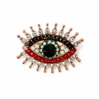 Brosche mit Kristallsteinen und Auge – Ethnisches und elegantes Design