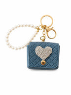 Luxus Mini-Taschenschlüsselanhänger mit Herzstein – roter Charm mit Perlendetails